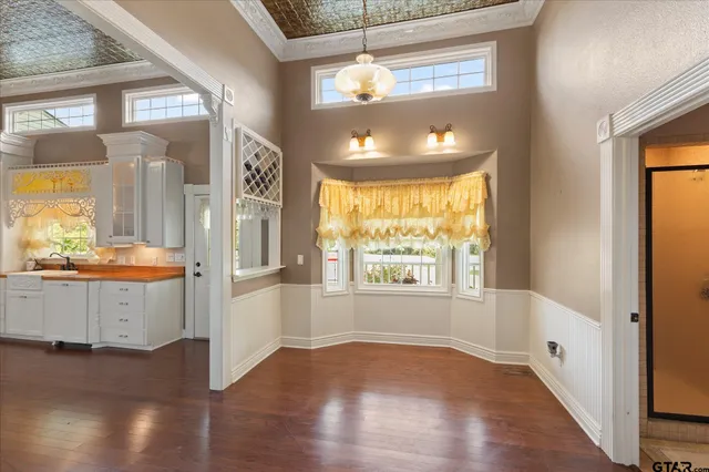 a view of a hallway with washer and dryer