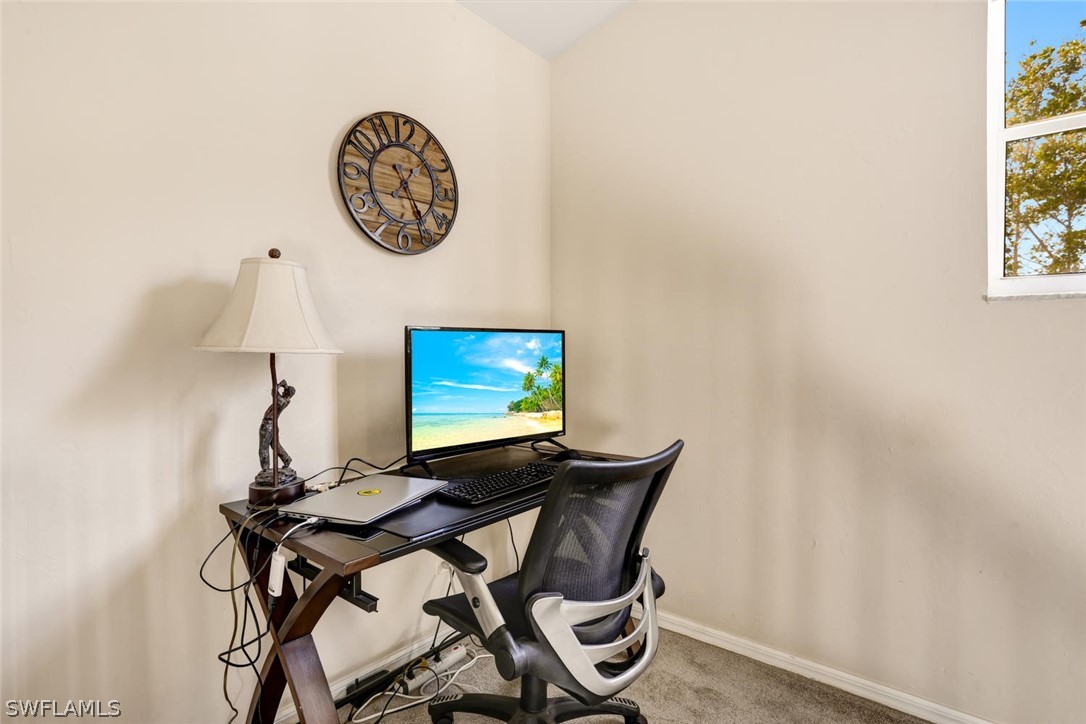 13710 Raleigh Lane, Unit 5 Fort Myers, FL 33919 - Photo 20 of 29 a view of a workspace with furniture and a window