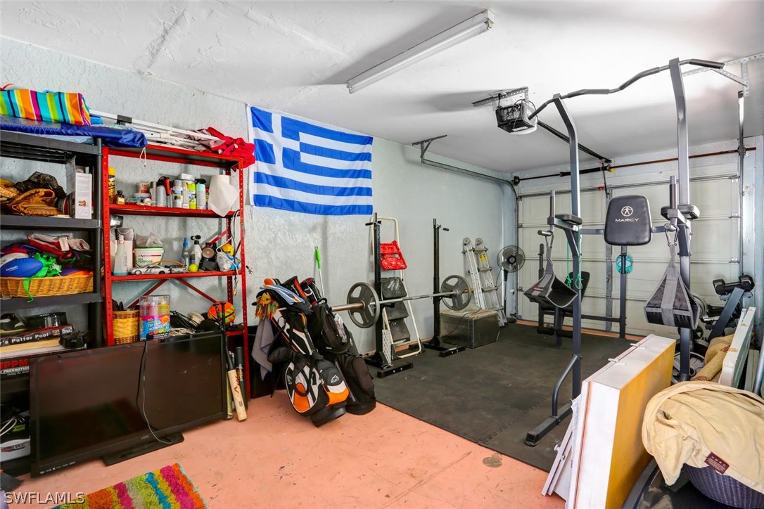 13710 Raleigh Lane, Unit 5 Fort Myers, FL 33919 - Photo 25 of 29 a view of a room with gym equipment