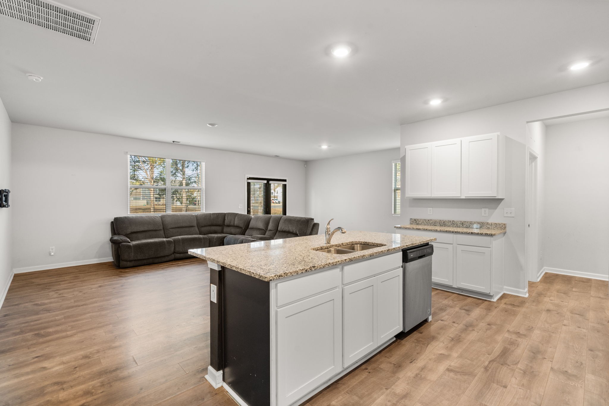 230 Willy Mae Road Murfreesboro, TN 37129 - Photo 5 of 23 a kitchen with a stove a sink and a refrigerator