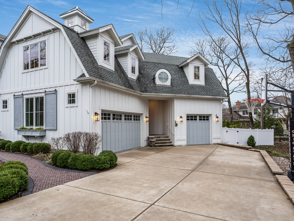 1049 Sylvan Circle Naperville, IL 60540 - Photo 3 of 3 a front view of a house with garden