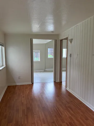 a view of an empty room with a window