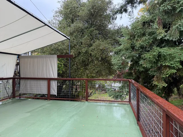 a view of swimming pool with a backyard