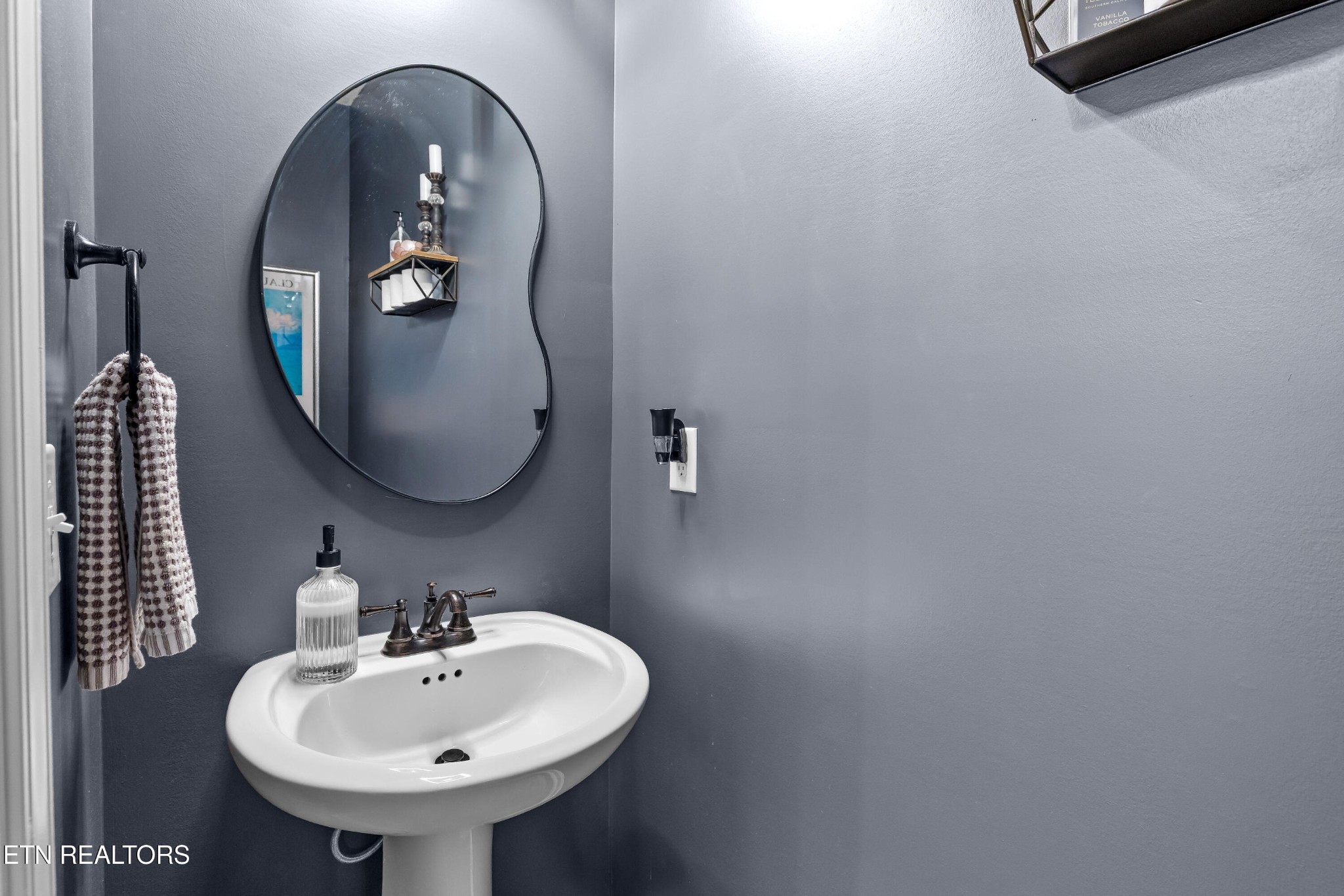 2918 Red Flame Road Knoxville, TN 37921 - Photo 19 of 39 a bathroom with a sink and a mirror