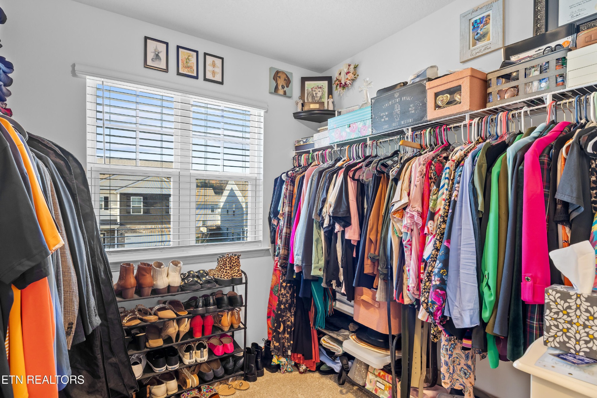 2918 Red Flame Road Knoxville, TN 37921 - Photo 23 of 39 a view of walk in closet with clothes
