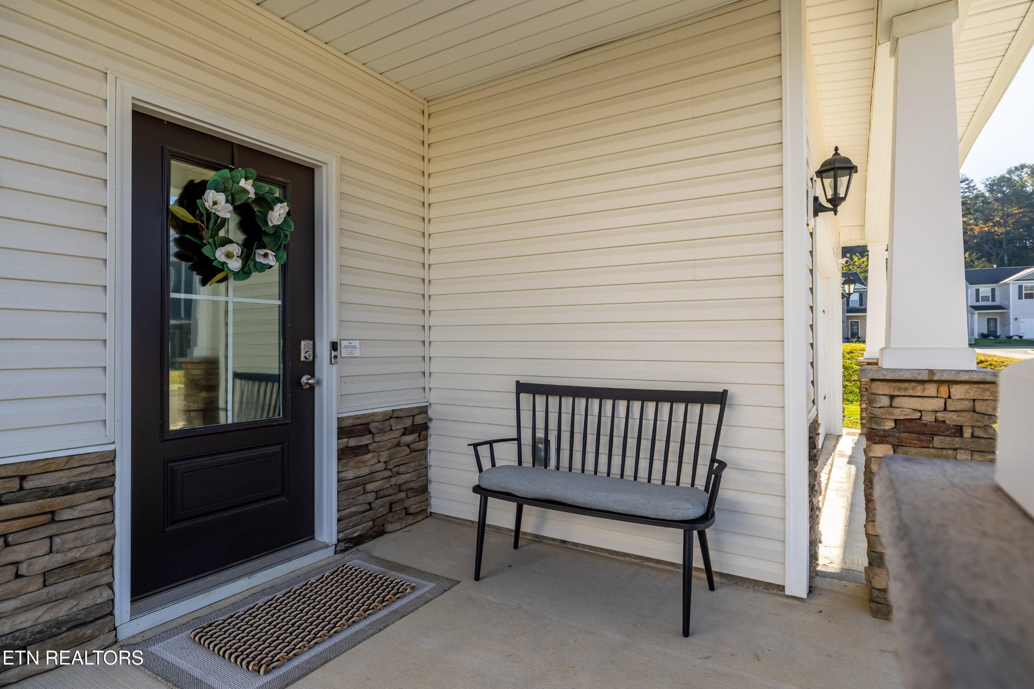 2918 Red Flame Road Knoxville, TN 37921 - Photo 3 of 39 a view of a porch with a bench