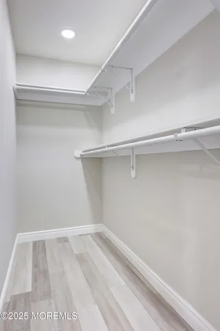 a view of an empty walk in closet
