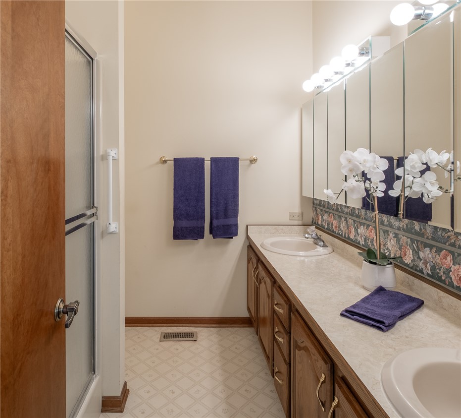 276 South Fairfield Road Bellbrook, OH 45305 - Photo 23 of 38 This functional bathroom features a dual vanity and a shower area for everyday convenience.