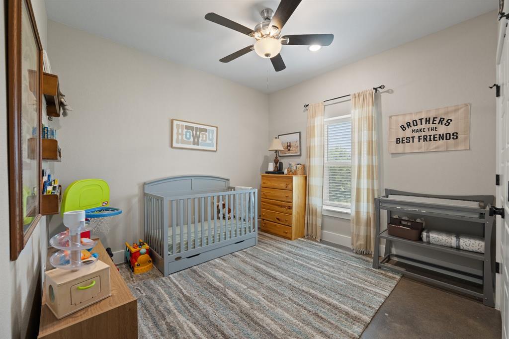 1031 Augustus Court Rio Vista, TX 76093 - Photo 13 of 30 Neutral-toned room featuring a ceiling fan, a window with blinds, and light-colored walls