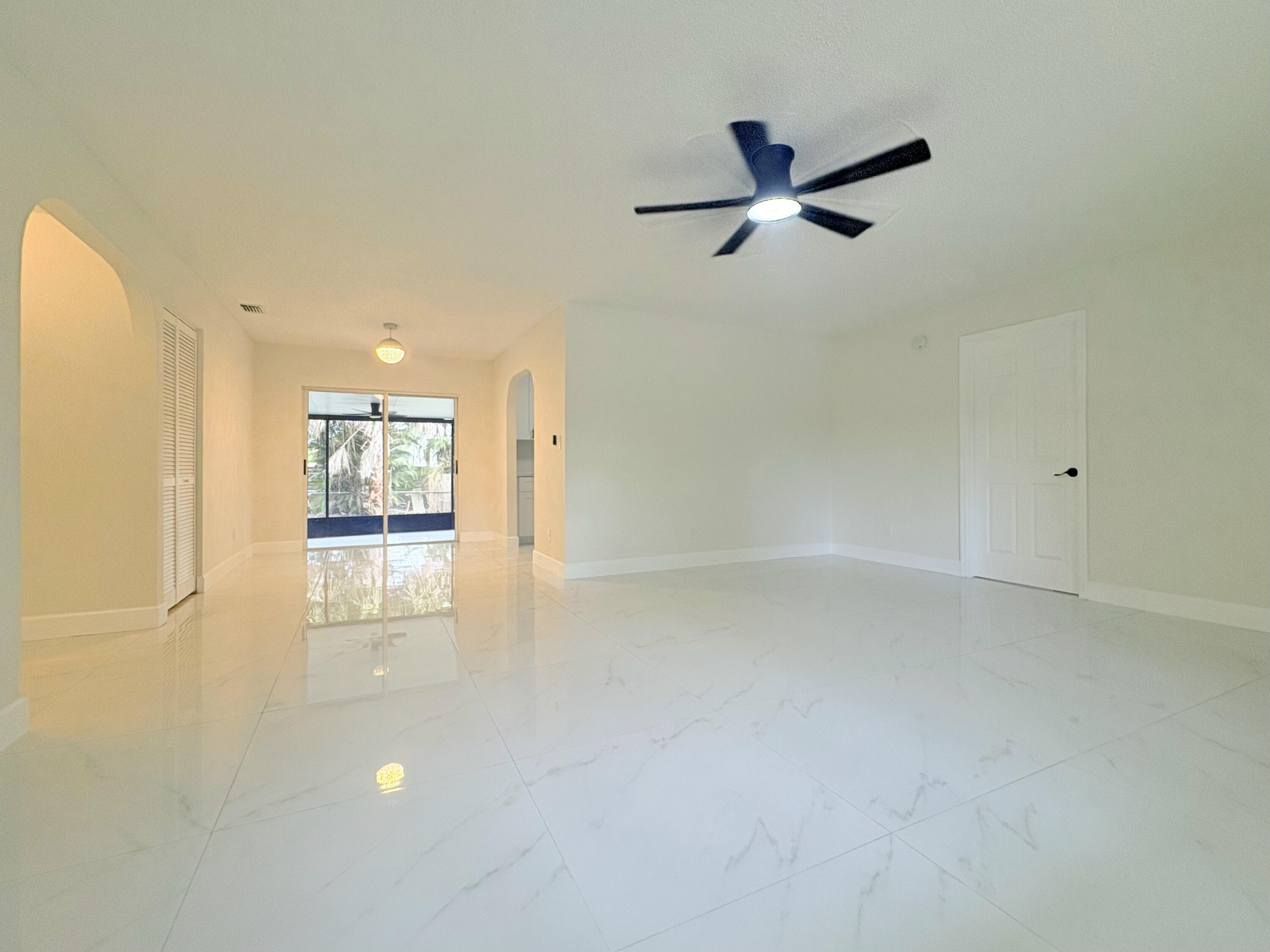 14523 Flamingo Road Loxahatchee Groves, FL 33470 - Photo 39 of 50 a view of empty room with wooden floor