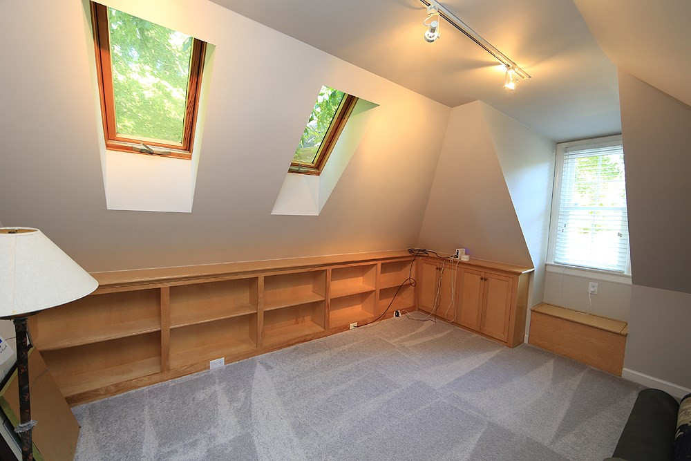 1901 Russell Drive Raleigh, NC 27612 - Photo 14 of 18 Bonus/Office with skylights, bookshelves, new carpet and ceiling fan. Bonus / Study / Office