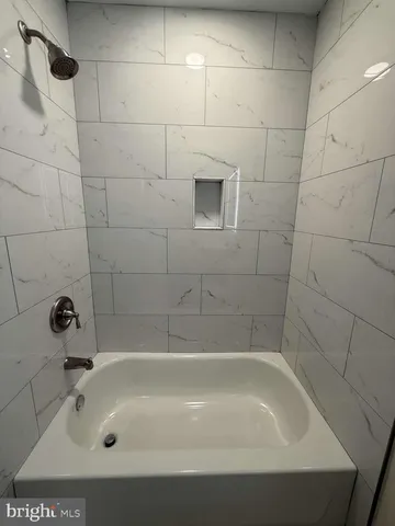 a bathroom with a bathtub