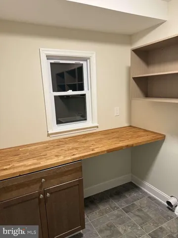 a view of storage and utility room