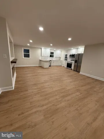 a view of a kitchen with a sink