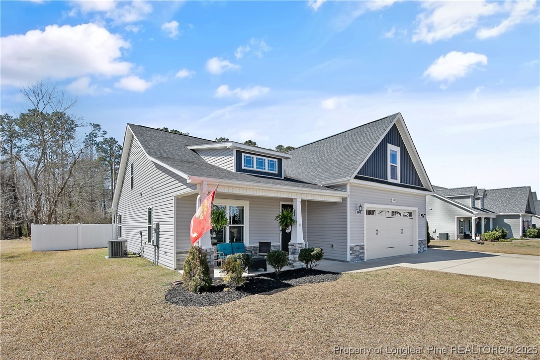 2628 Riddle Farm Road Hope Mills, NC 28348 - Photo 4 of 50 a view of a house with backyard and porch