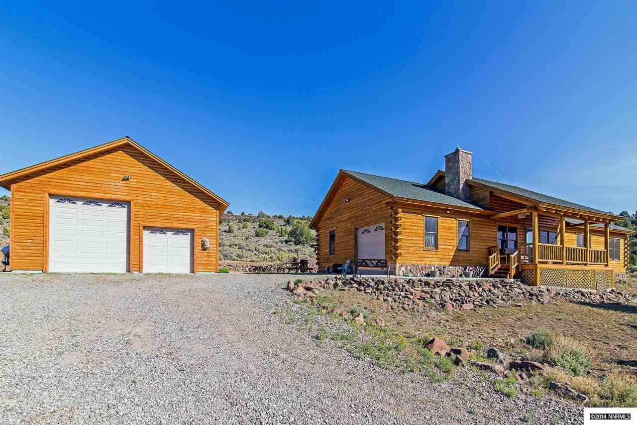 3390 Bullfrog Road Reno, NV 89521 - Photo 1 of 1 a front view of a house with a yard
