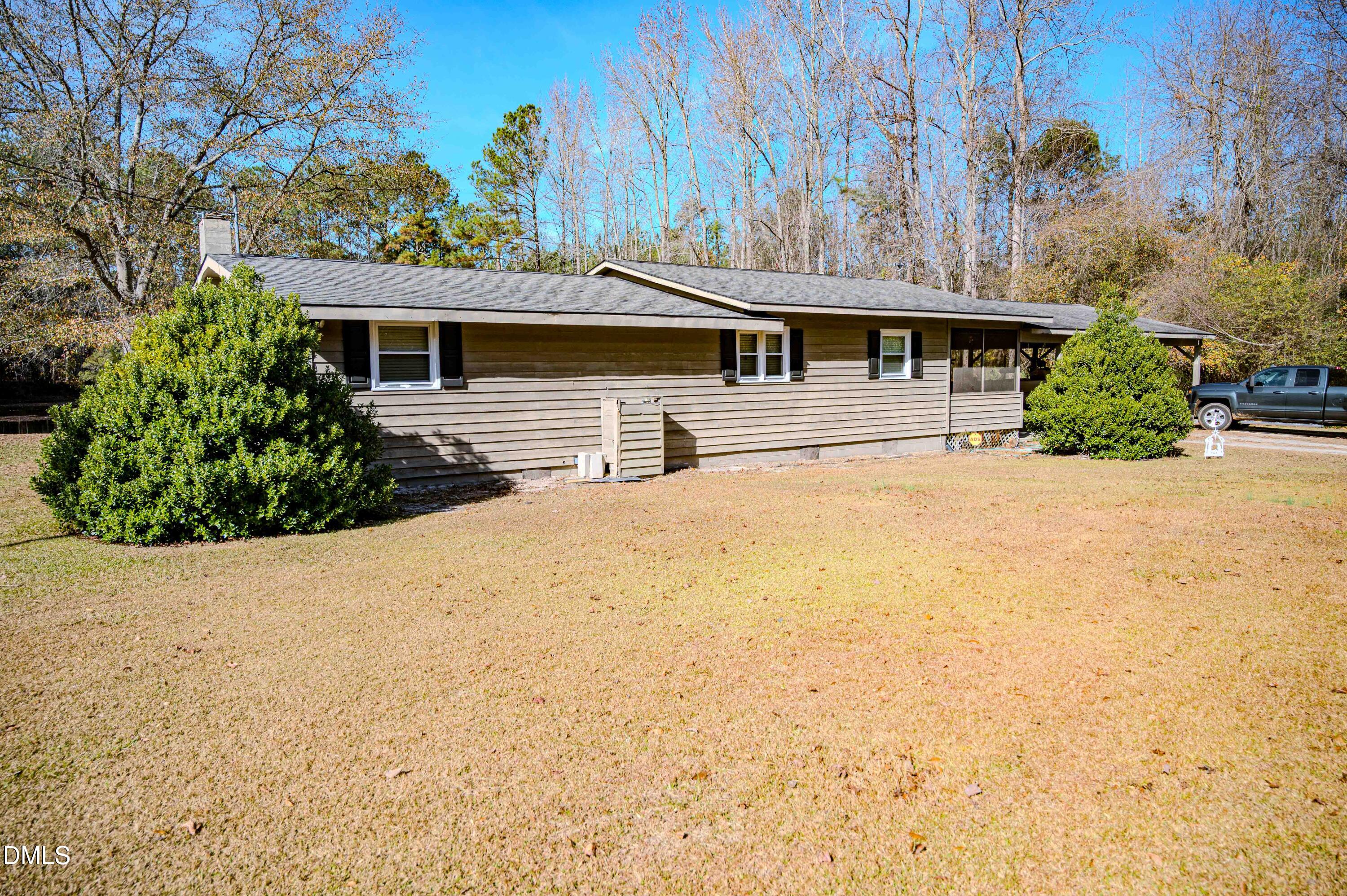 5131 Ponderosa Road Sanford, NC 27332 - Photo 13 of 51 front view of house with a yard