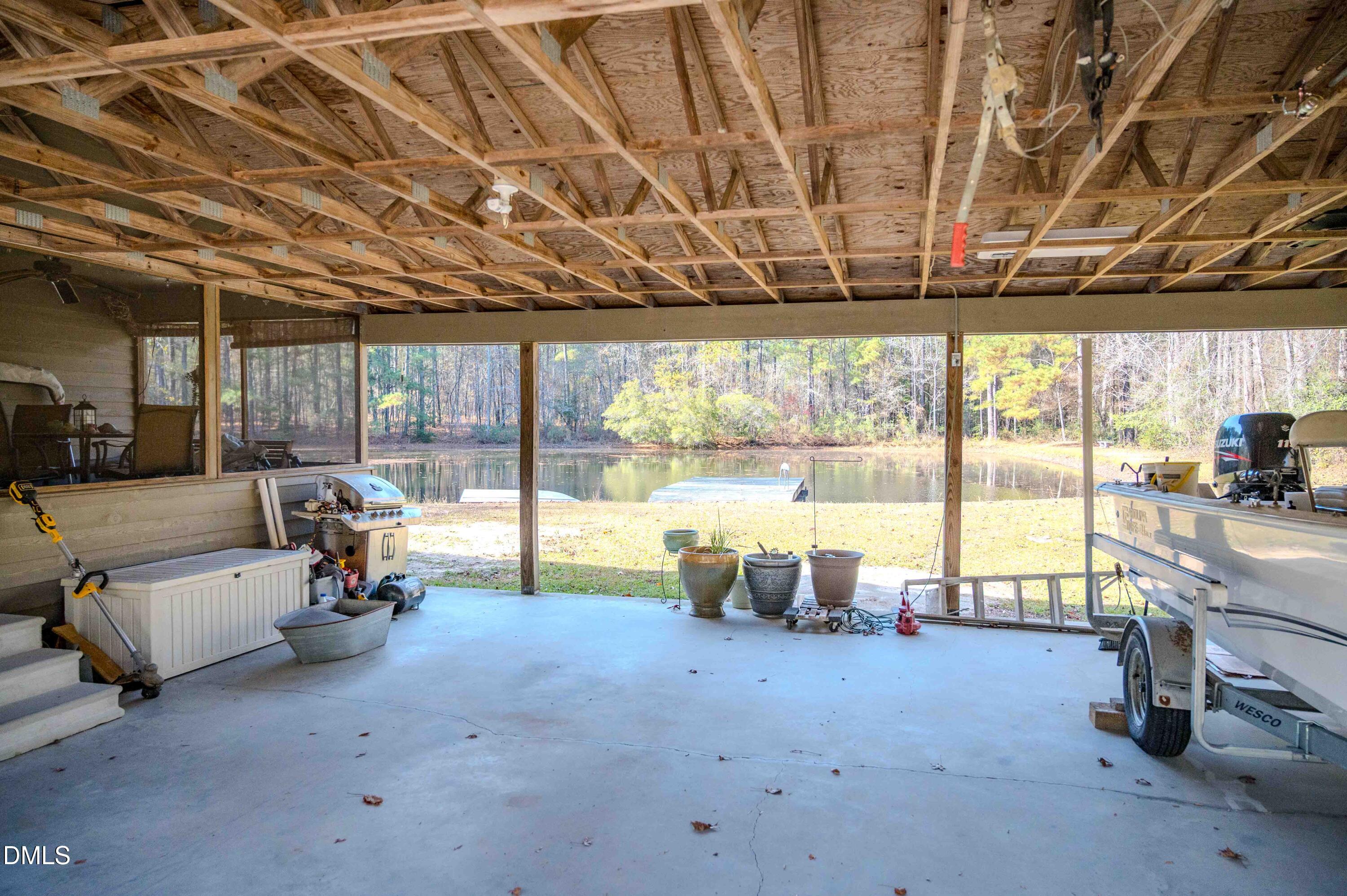 5131 Ponderosa Road Sanford, NC 27332 - Photo 18 of 51 a living room with furniture and a large window