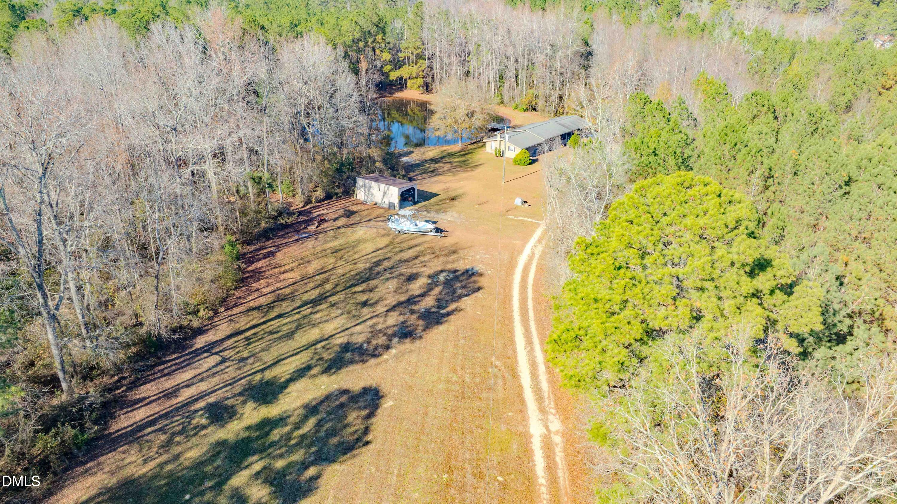 5131 Ponderosa Road Sanford, NC 27332 - Photo 25 of 51 a view of a swimming pool with a yard