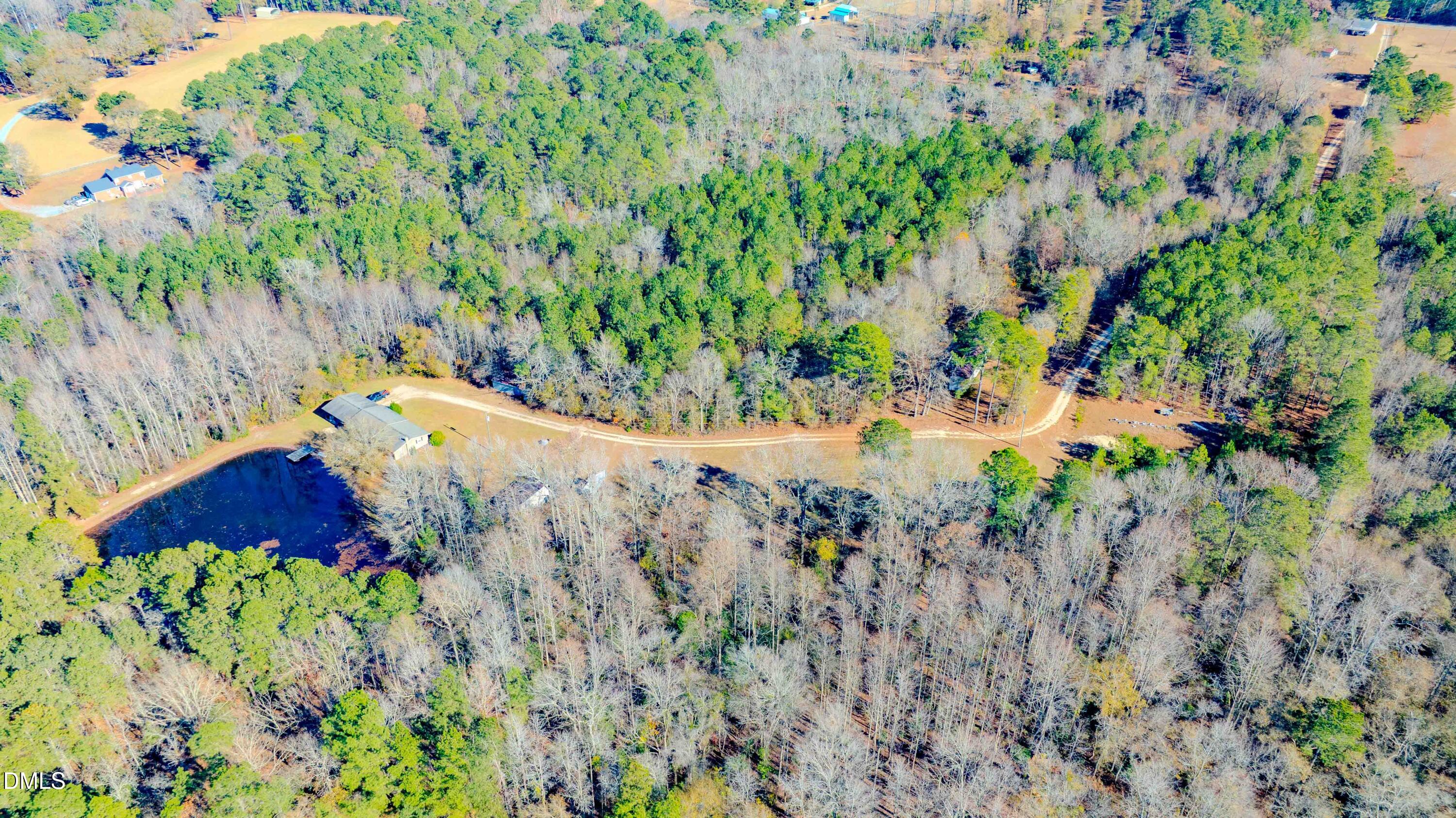 5131 Ponderosa Road Sanford, NC 27332 - Photo 27 of 51 a view of a garden with a tree