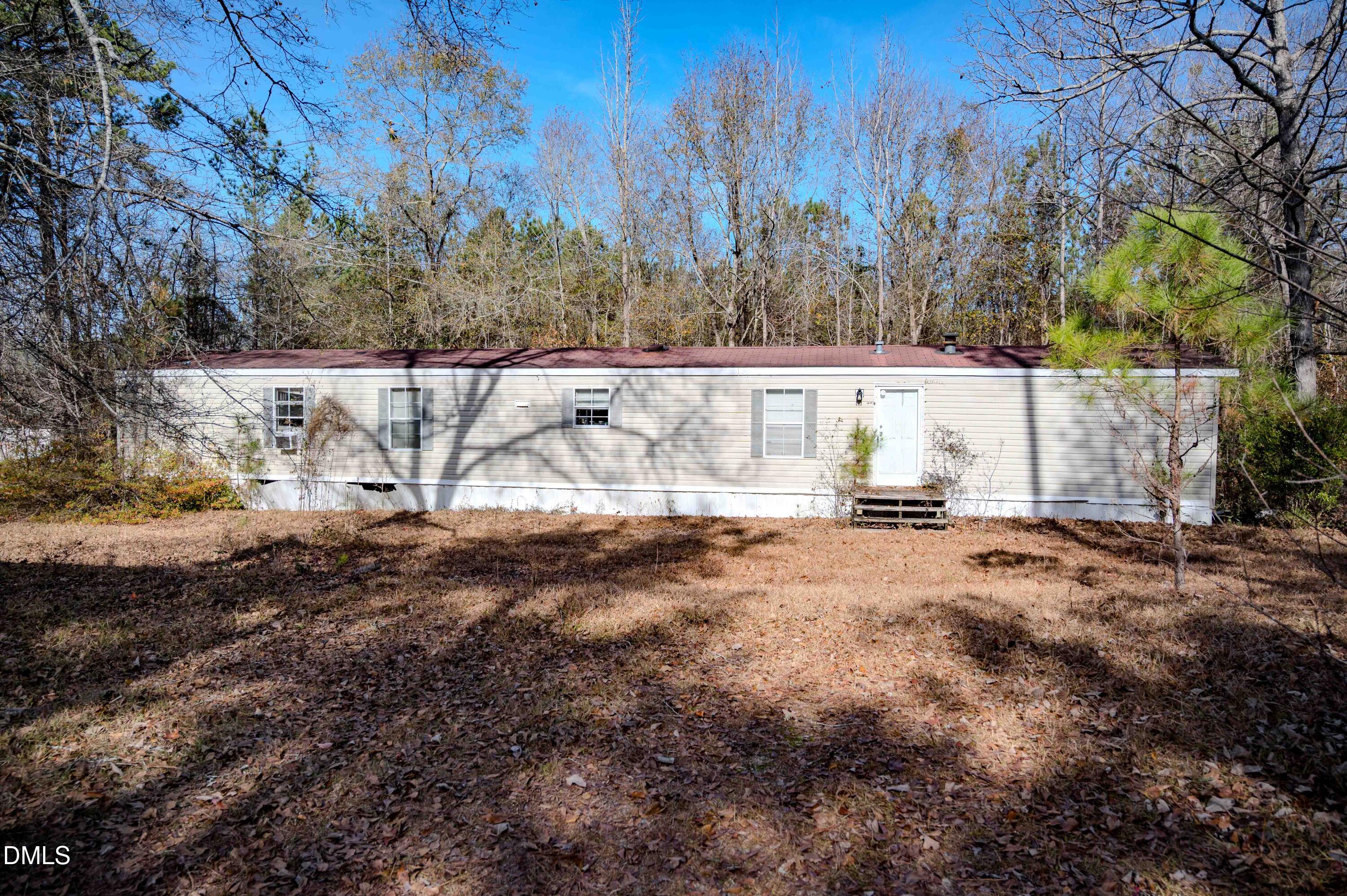 5131 Ponderosa Road Sanford, NC 27332 - Photo 44 of 51 a view of small yard with large trees