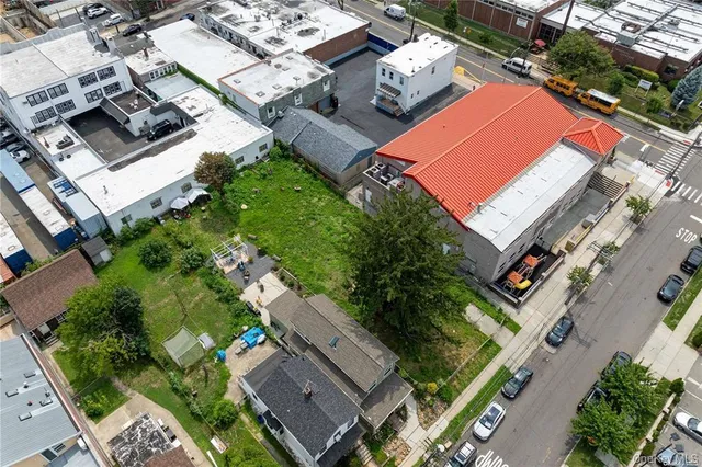 an aerial view of residential house with outdoor space