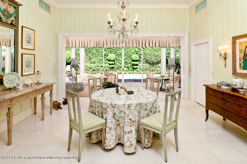 66 Middle Road Palm Beach, FL 33480 - Photo 3 of 11 a view of a dining room with furniture a chandelier and large windows