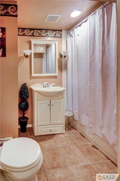 24 Princeton Road Old Bridge, NJ 08859 - Photo 22 of 25 a bathroom with a sink toilet and shower