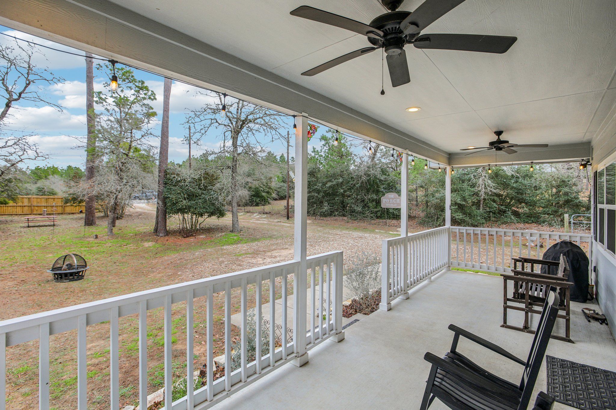 198 Kelley Road East Bastrop, TX 78602 - Photo 1 of 40 a view of a porch and garden
