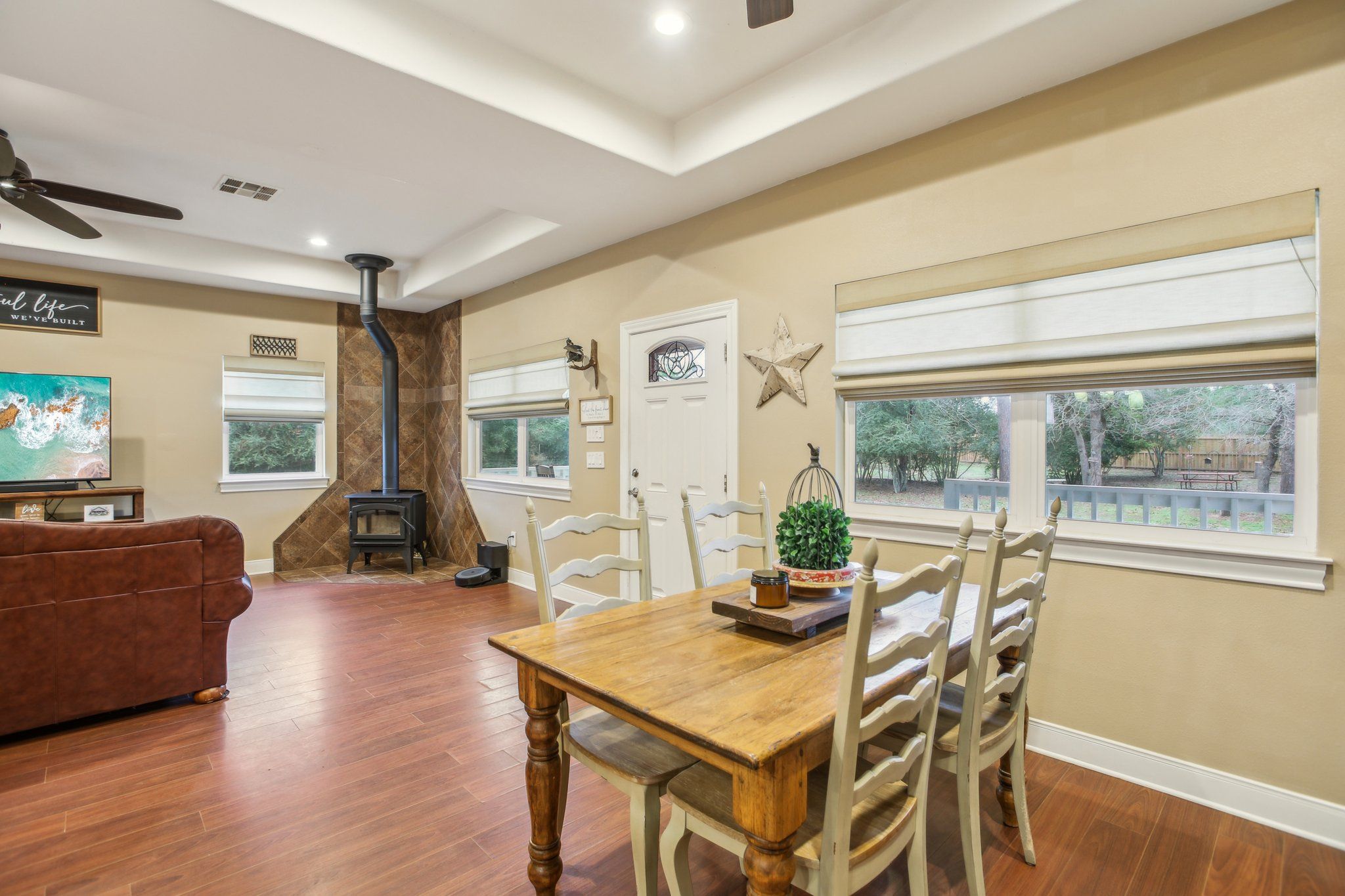 198 Kelley Road East Bastrop, TX 78602 - Photo 12 of 40 a view of a dining room with furniture window and wooden floor
