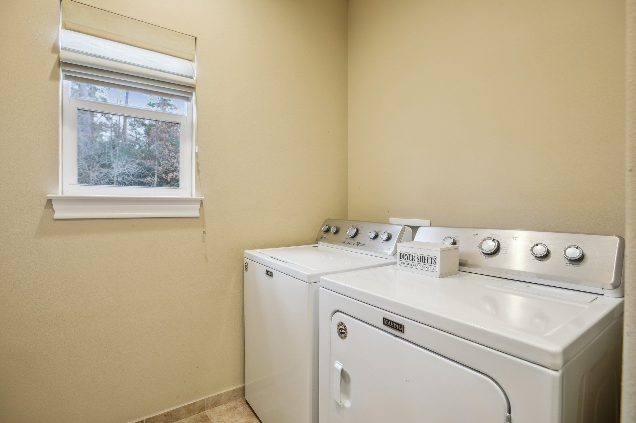 198 Kelley Road East Bastrop, TX 78602 - Photo 17 of 40 a utility room with dryer and washer