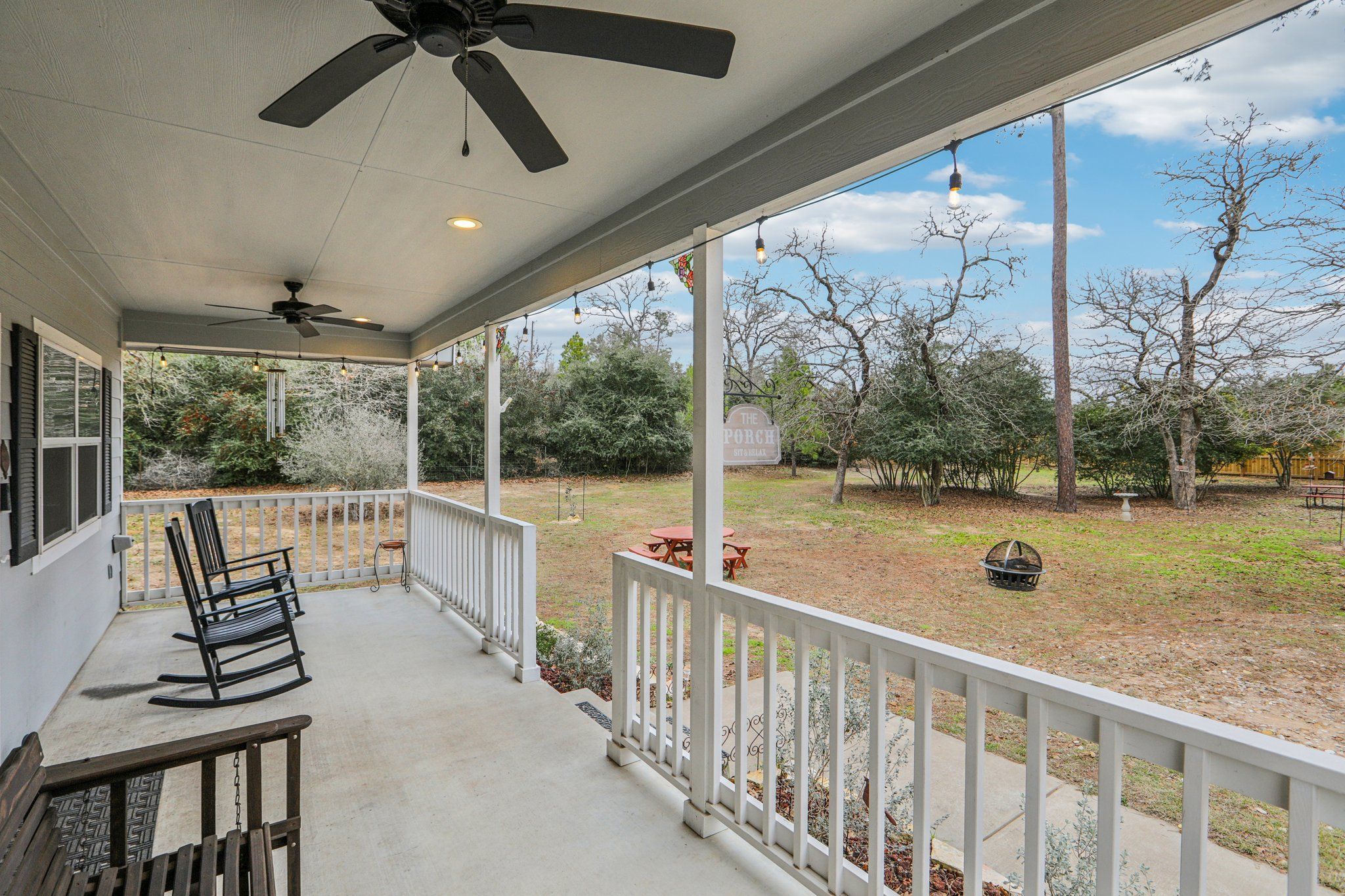 198 Kelley Road East Bastrop, TX 78602 - Photo 32 of 40 a view of roof deck with furniture and garden