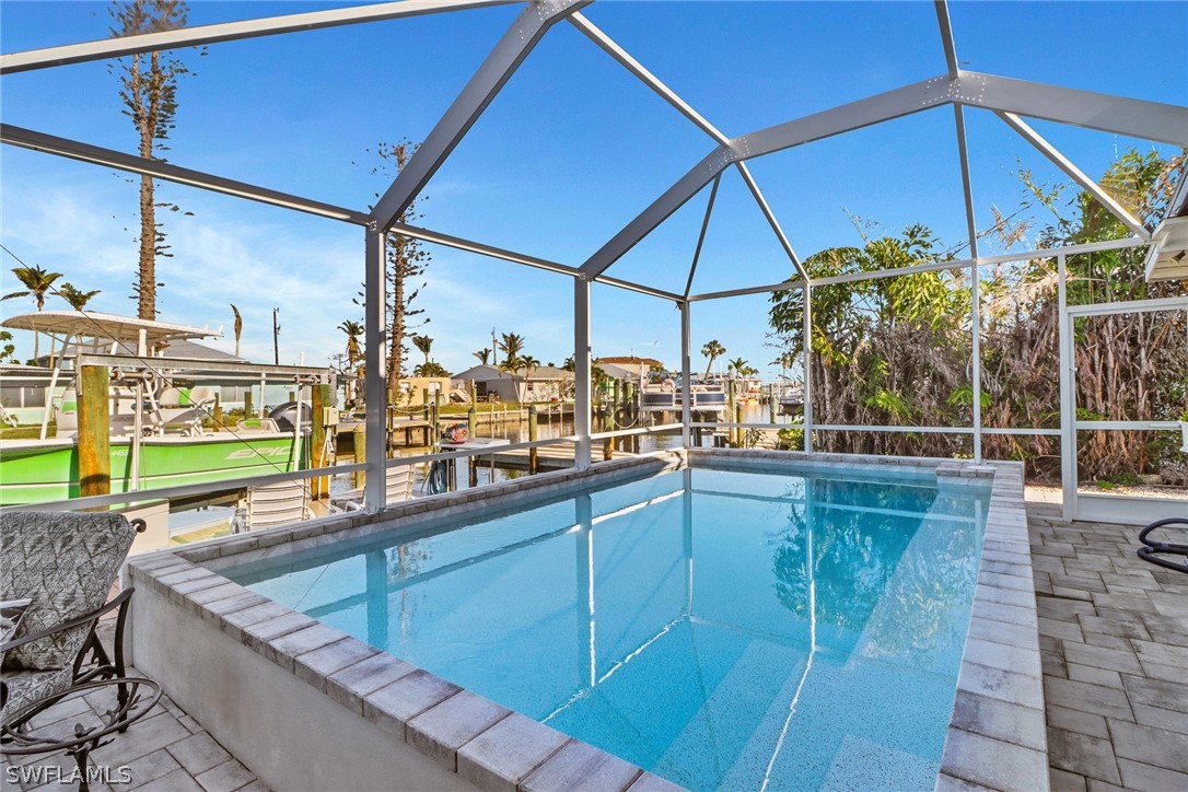 2574 Bayshore Drive Matlacha, FL 33993 - Photo 9 of 43 a outdoor view with a sitting space