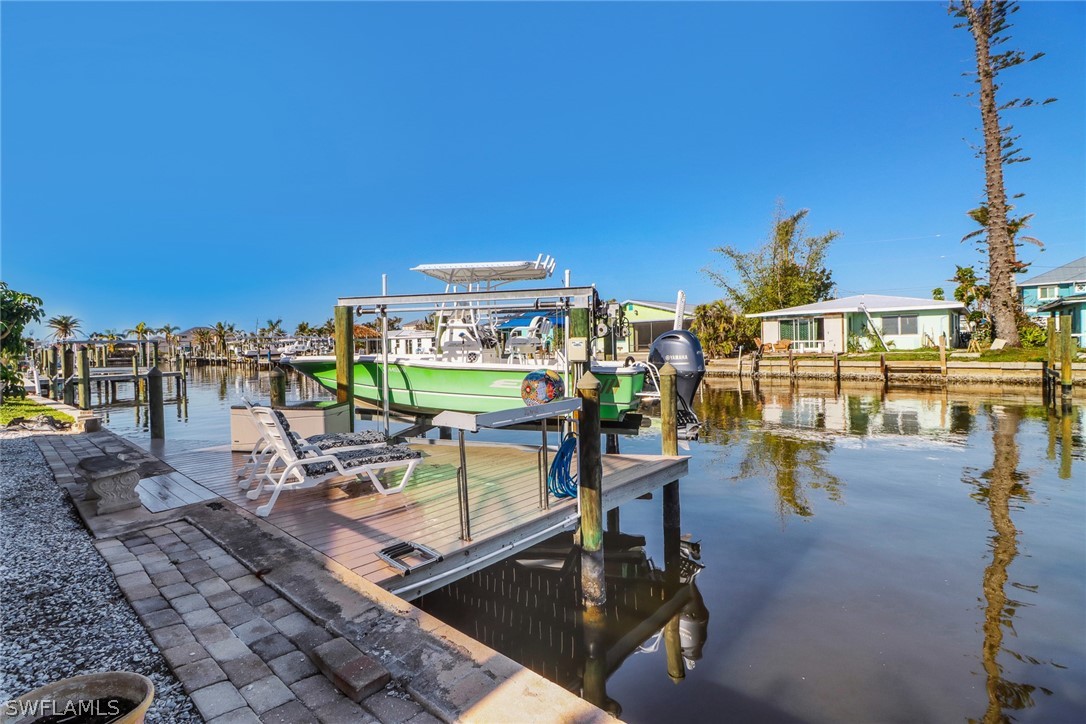 2574 Bayshore Drive Matlacha, FL 33993 - Photo 10 of 43 a view of a swimming pool with outdoor seating space