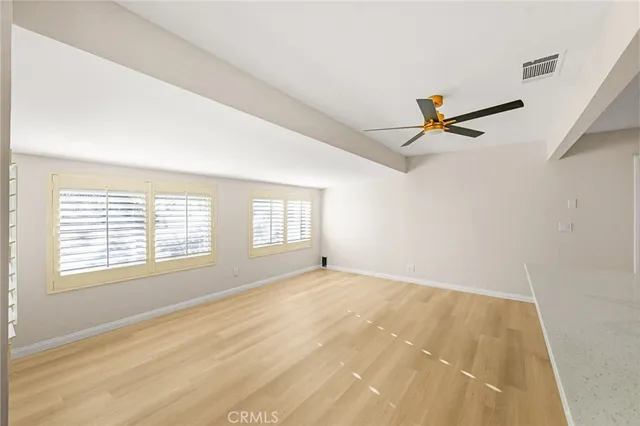 a bathroom with a sink mirror toilet and bathtub