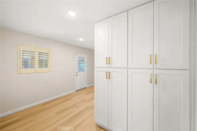 a bathroom with a glass shower door