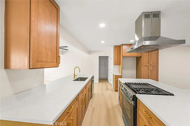 a kitchen that has a stove and a table