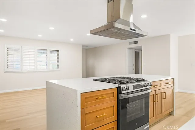 a view of a livingroom with a ceiling fan and window