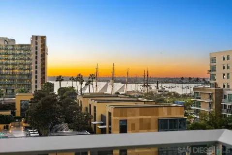 a view of a city with tall buildings