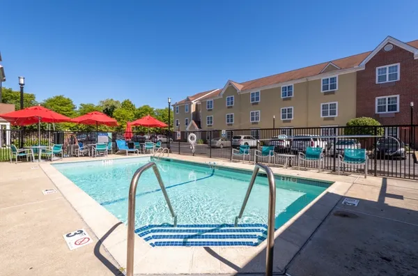 a view of a house with sitting area and furniture