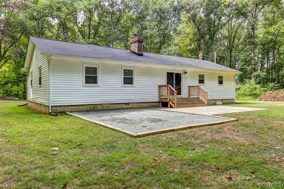 18018 Beaver Dam Road Beaverdam, VA 23015 - Photo 3 of 35 Rear view showcasing a gravel patio area perfect for your fire pit and a new stamped concrete patio.