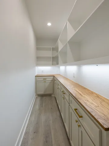 a view of a kitchen with a sink and dishwasher