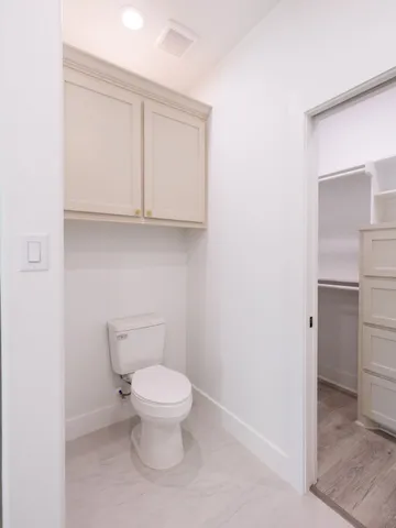 a bathroom with a toilet
