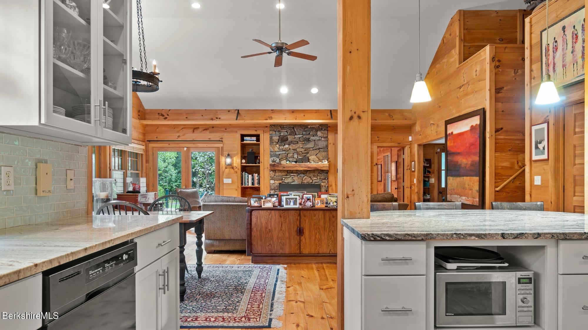30 Lake Mansfield Road Great Barrington, MA 01230 - Photo 11 of 35 a kitchen with stainless steel appliances granite countertop a stove and a sink