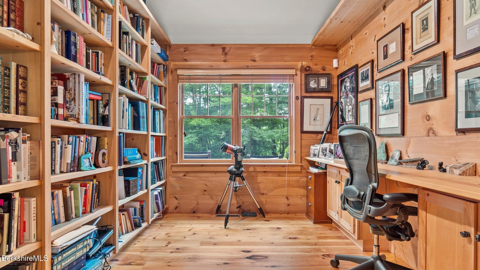 30 Lake Mansfield Road Great Barrington, MA 01230 - Photo 18 of 35 a view of a workspace with furniture and a bookshelf