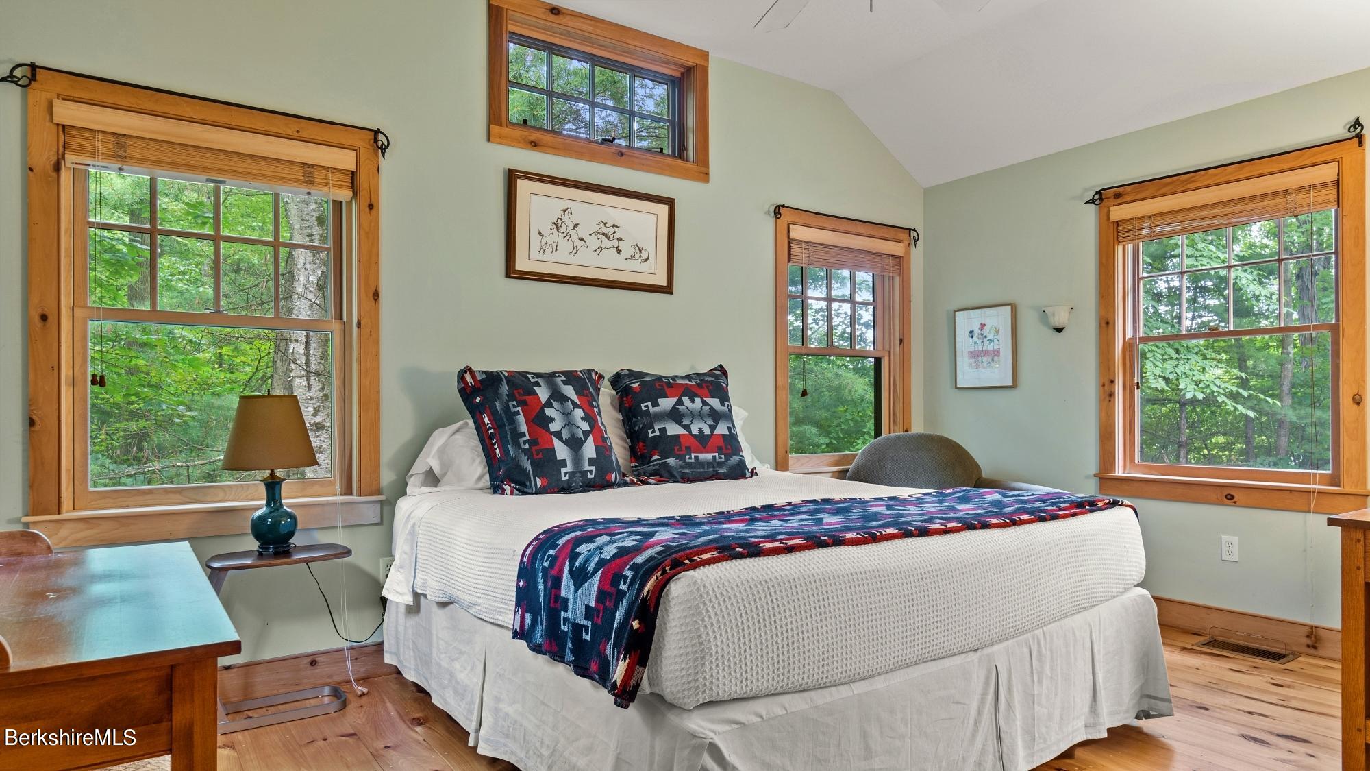 30 Lake Mansfield Road Great Barrington, MA 01230 - Photo 22 of 35 a bedroom with a bed and a window