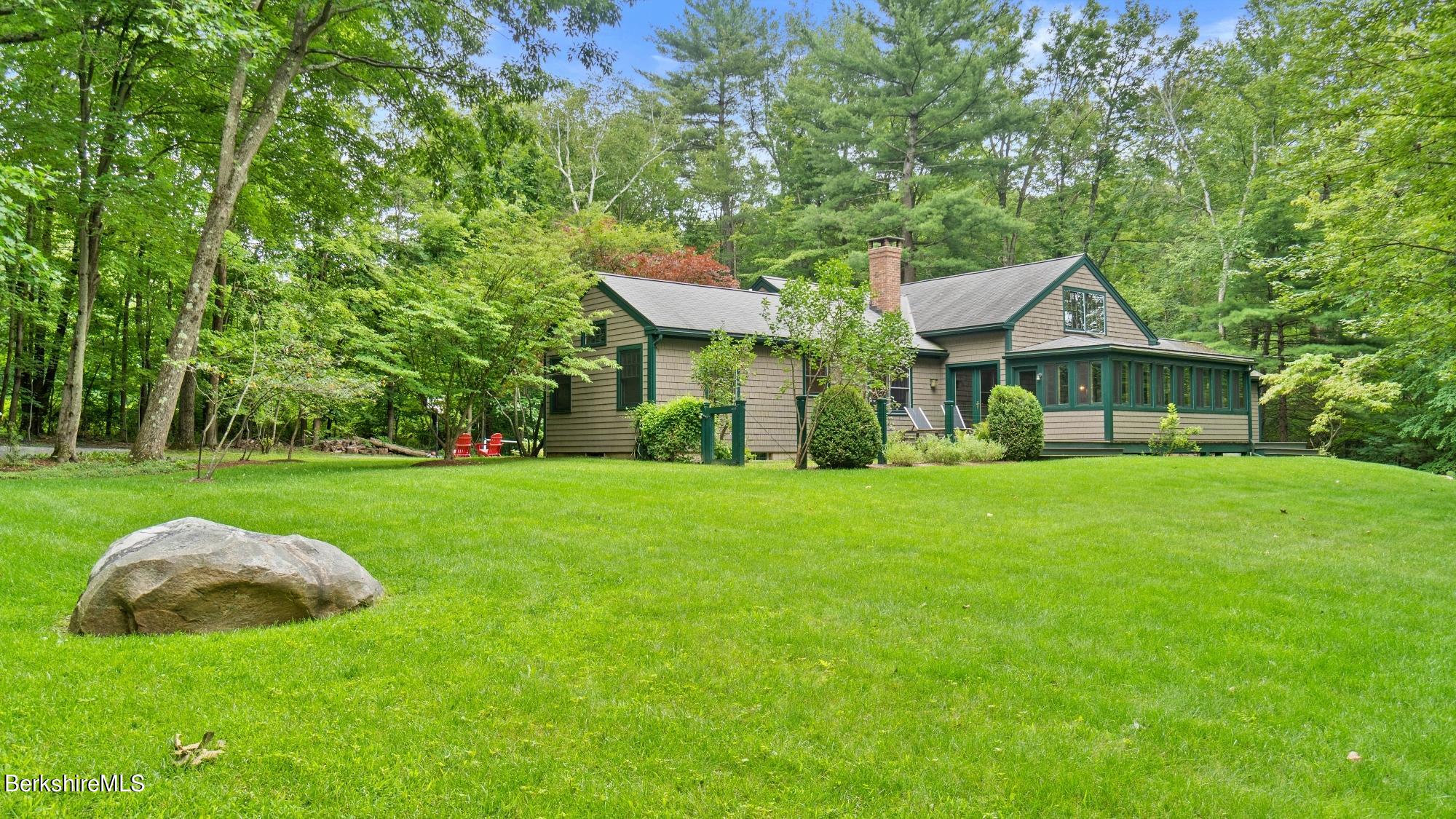30 Lake Mansfield Road Great Barrington, MA 01230 - Photo 28 of 35 a front view of a house with garden