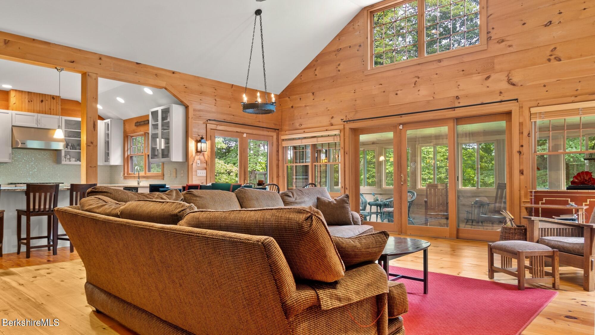 30 Lake Mansfield Road Great Barrington, MA 01230 - Photo 8 of 35 a living room with furniture a floor to ceiling windows and floor to ceiling windows