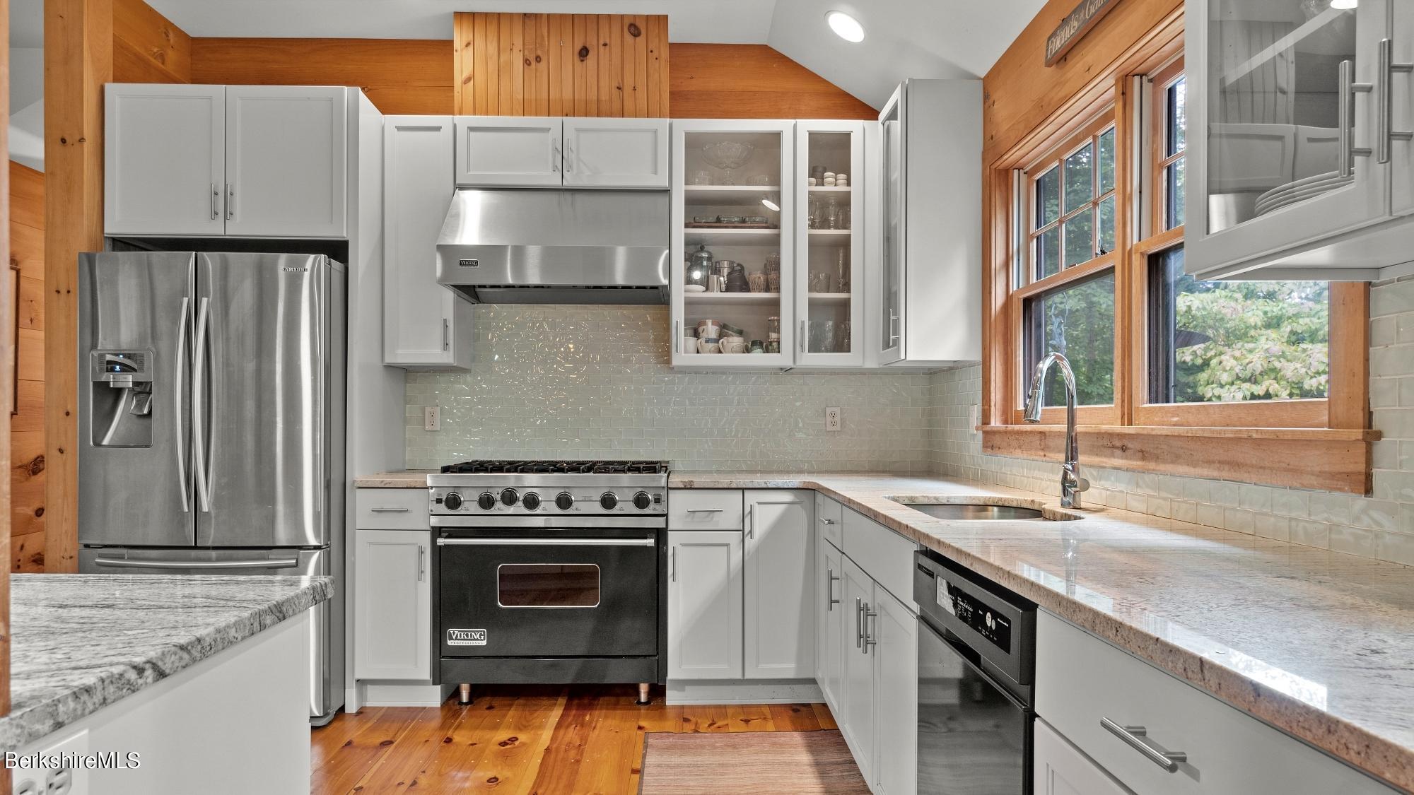 30 Lake Mansfield Road Great Barrington, MA 01230 - Photo 10 of 35 a kitchen with a sink stove and cabinets