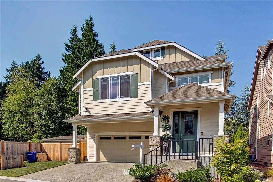 22326 9th Drive Southeast Bothell, WA 98021 - Photo 1 of 40 a front view of a house with garden